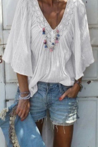 products/Lace_v-neck_ruffled_flared_blouse_2.jpg